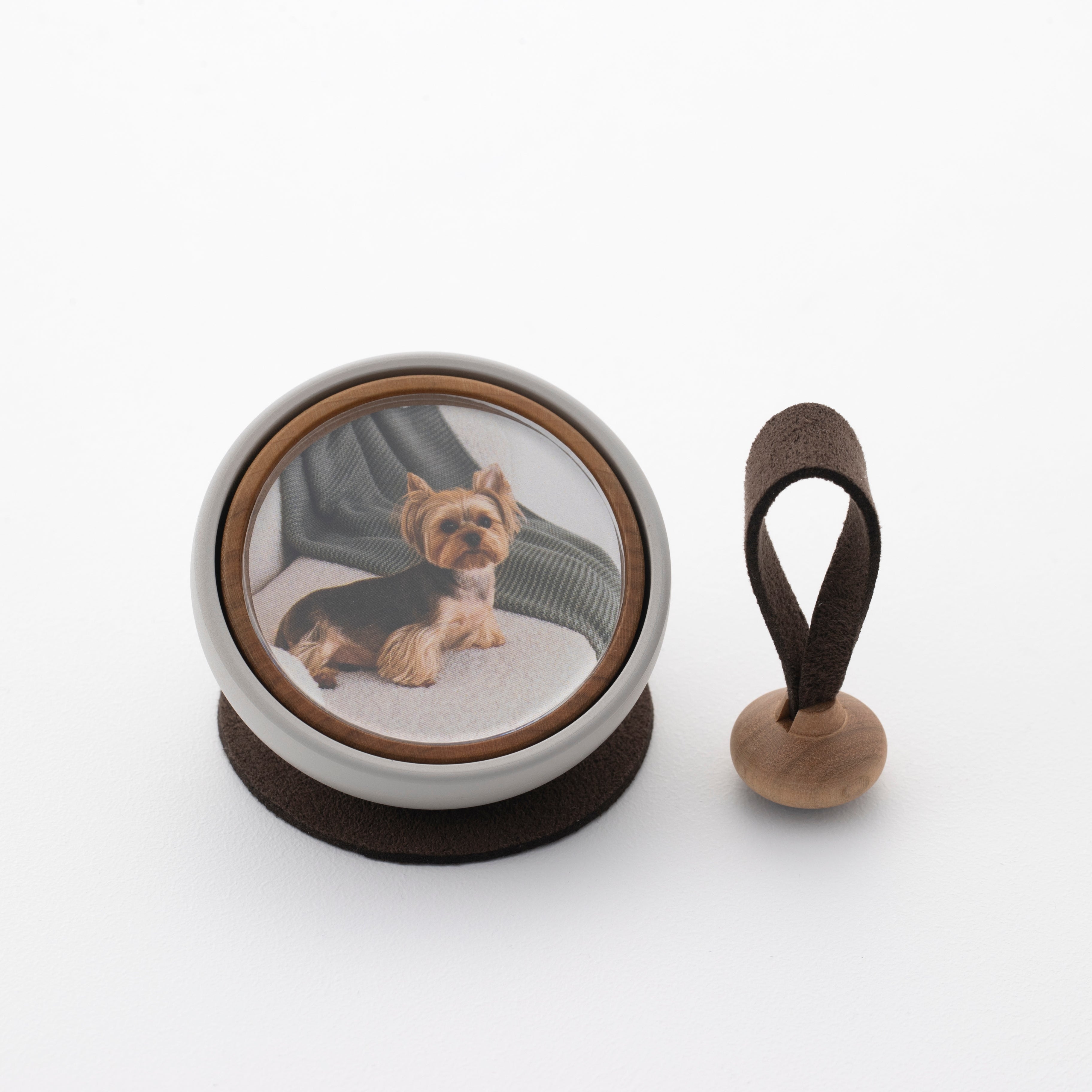 Tailo pet memorial bell in Chocolate with a dark brown mallet and mat