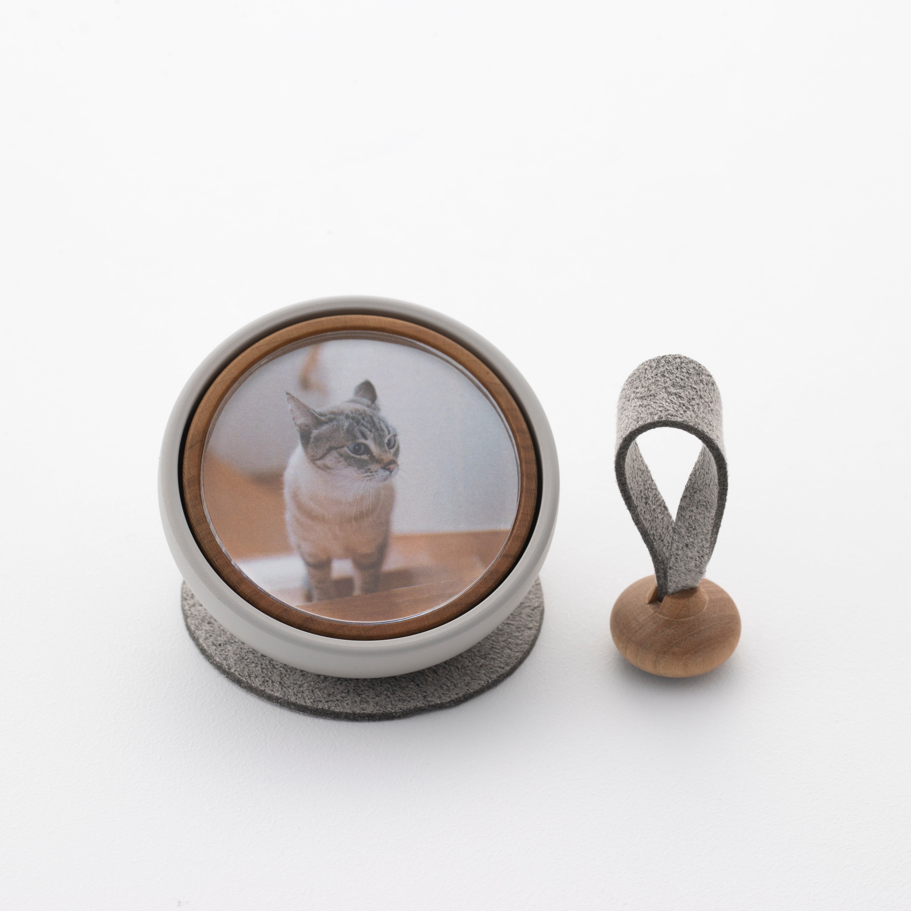 Tailo pet memorial bell in Mixed Gray designed for modern interiors